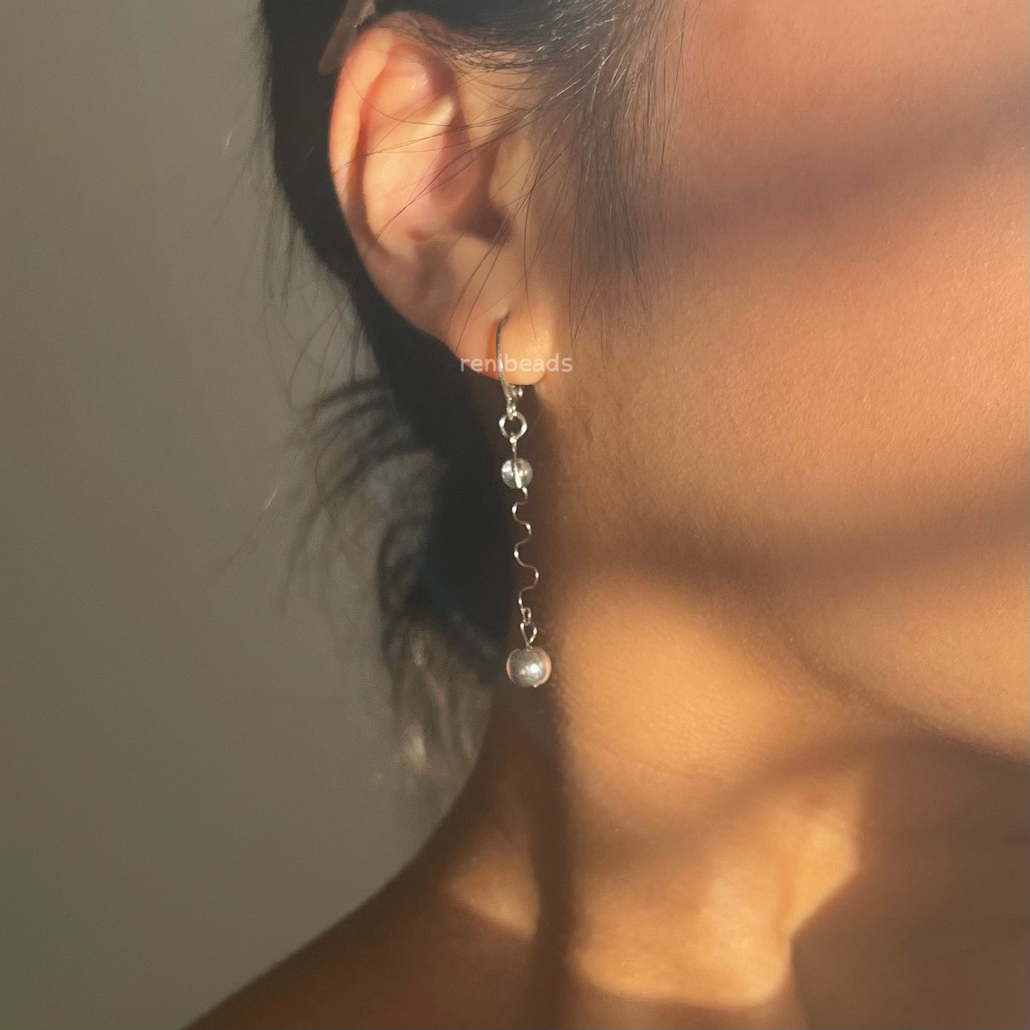 Silver Swirly Dangle Earrings