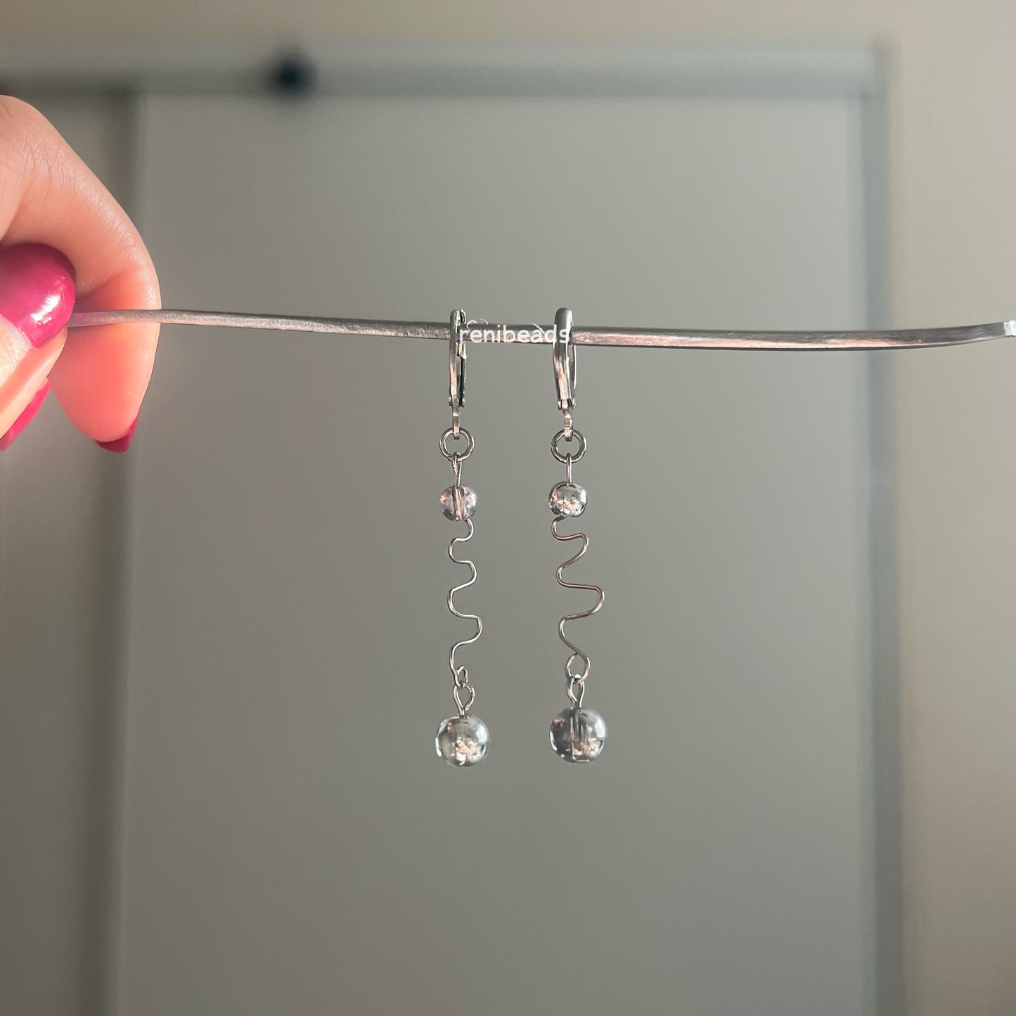 Silver Swirly Dangle Earrings