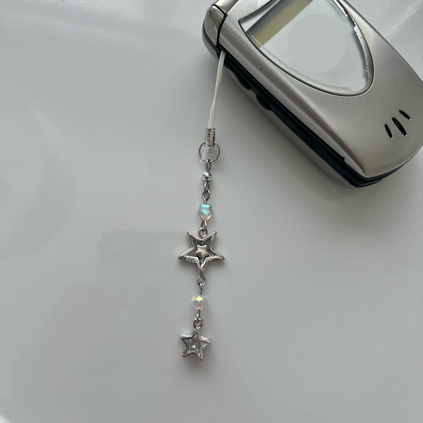 Cyber Stars - Silver star phone charm