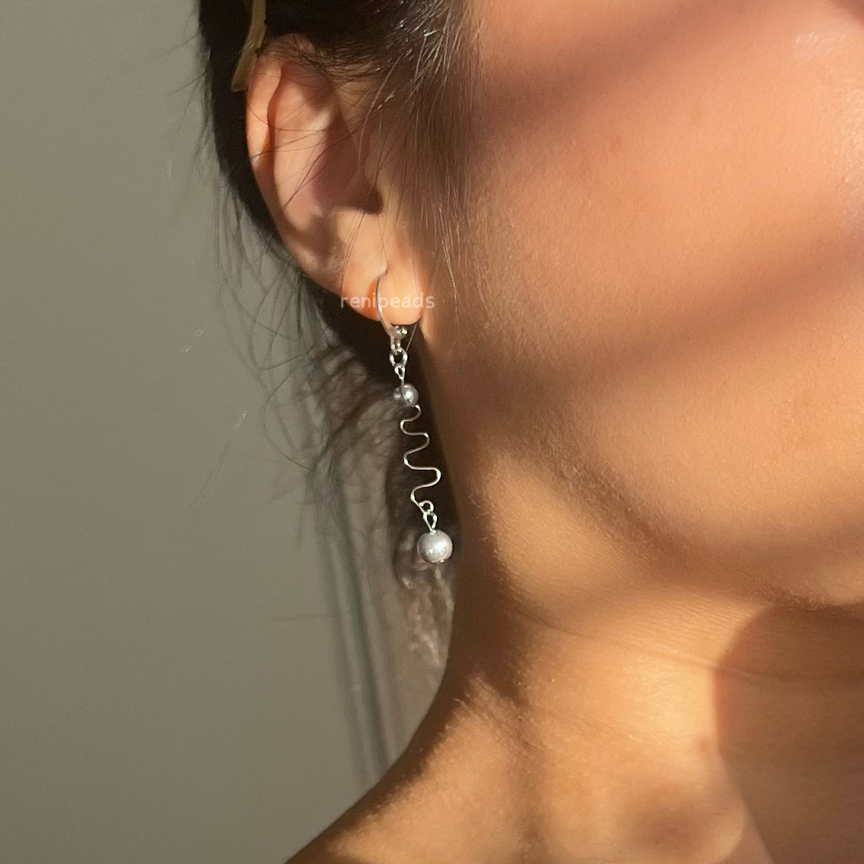 Silver Swirly Dangle Earrings