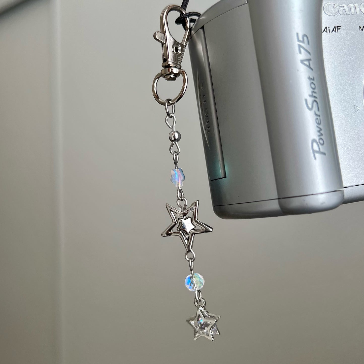 Cyber Stars - Silver star phone charm