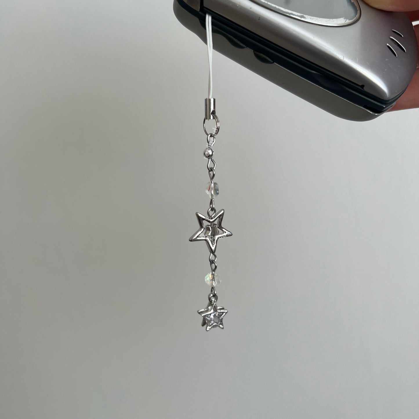 Cyber Stars - Silver star phone charm