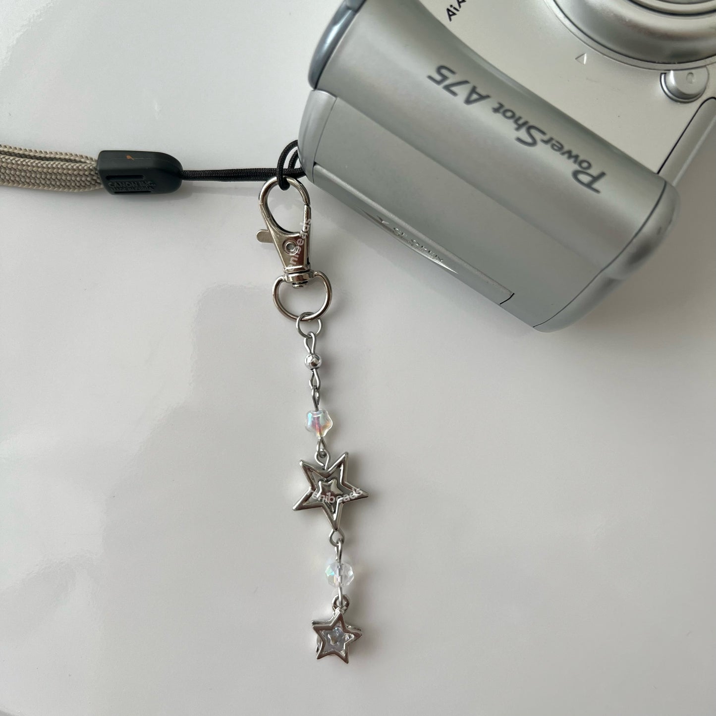Cyber Stars - Silver star phone charm